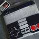 Illustration for article titled Netbook Cover Fashions Itself in the Likeness of an NES Controller
